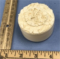 Fabulous carved ivory box with flowers carved on b
