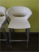 White plastic bar stool