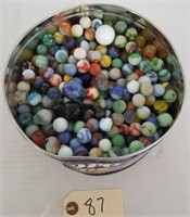 TIN OF MARBLES