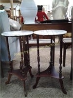 Pair of round marble top tables