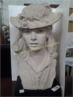 Bust of lady in hat with flowers