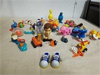 Group of collectible wind-up toys include Star