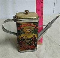 Vintage metal watering tin can