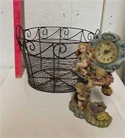 Decorative metal basket and cherub decorative