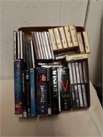 Vintage 8-track tapes, cassette tapes, with DVDs