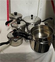 Group of Farberware aluminum clad pots and pans