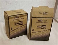 Two boxes of champion single carded spark plugs