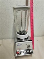 Osterizer 14 speed blender with glass pitcher