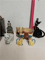Cat statues and planter