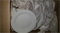 Box of wrapped dinner plates