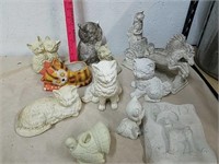 Group of cat and other garden statues