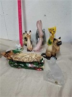 Group of cat statues and decor