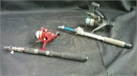 Two telescopic fishing poles with reels