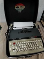 Electric Smith Corona typewriter in case