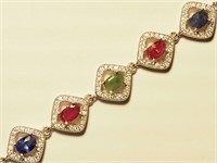 $1000. S/Silver Sapphire Emerald Ruby Bracelet