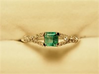 $2100. 14KT Diamonds with 1 Emerald Ring