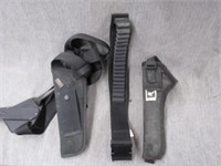 2 holsters and a ammo belt.