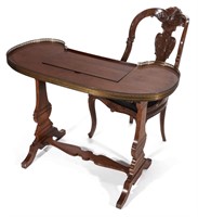 A KIDNEY SHAPE LADIES DESK ATTRIBUTED TO BAKER