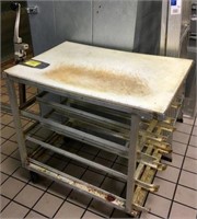 ROLLING CUTTING TABLE W/CAN OPENER. WITH RACKS