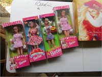 8 Barbie Dolls