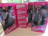 12 Barbie dolls