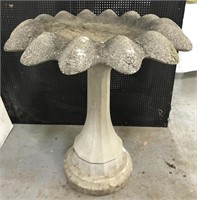 Weathered concrete birdbath