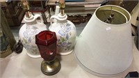 Two pottery lamps with shades, red glass shade