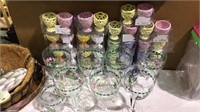 34 Easter egg cup holders and 8 Easter glasses,