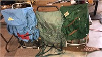 Three vintage backpacks with the back frames