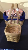 Two Longaberger baskets, one with liner and extra