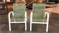 Two Childs patio chairs green in color. (738)