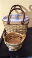 Two small Longaberger baskets, one with leather