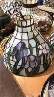 Floral leaded glass hanging light with a brass