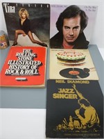 4 albums vinyles dont The Rolling Stones et livre*