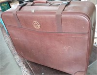 Large Rolling Vintage Soft Sided Suitcase