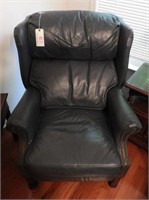 Blue leather Queen Anne style recliner with