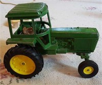 John Deere toy tractor metal with plastic wheels