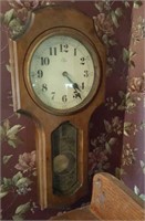 Elgin battery operated wall clock in dark wood
