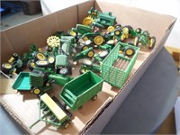 Group of John Deere small scale tractors
