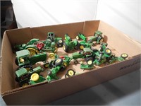 Group of small scale John Deere tractors
