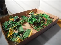 Group of John Deere small scale implements