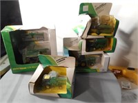 Group of new Ertl small scale combines