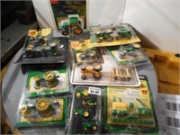 Group of Ertl new tractors related pieces