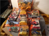 Group of new Matchbox cars and construction equip