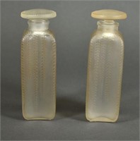 Pair of 1920's Lalique Triomphe Perfume Bottles