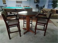 Used bar height table and three bar stools