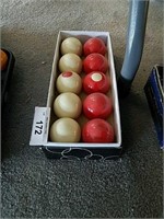 Box of 10 red and white pool balls