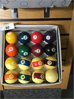 SET OF POOL BALL WITH YELLOW TINT