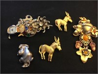 Lot of brooches- donkeys, eeyore, Judy lee