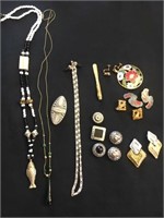 Lot of costume jewelry- fish necklace , brooches s